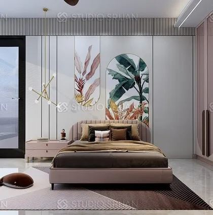 A beautiful bedroom in Paschim Marg, Gurugram, with a soft, feminine touch. The design features a pink and white color scheme, with botanical art panels above the bed.