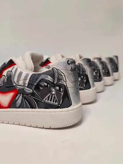 A lineup of the Darth Vader shoes from the Star Wars collection. Each one was hand-painted, making them true collectibles. "Come to the dark side."