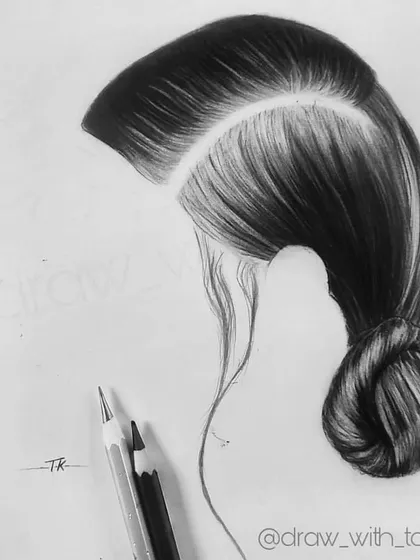 A charcoal study focused on drawing a woman's hairstyle. I concentrated on the flow of the hair, the shine of the highlights, and the deep shadows within the bun to make it look realistic.