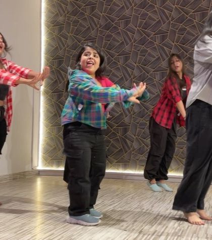 A candid shot from our anniversary celebration performance. I love seeing the kids completely lost in the music and the movement.