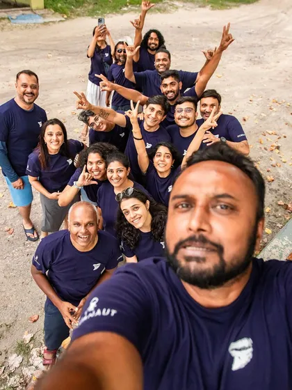 The fun doesn't stop when we surface. This is our crew after an amazing day of diving with tiger sharks in Fuvamulah, Maldives. We start as strangers but end the trip as a family, sharing stories and a love for the ocean.