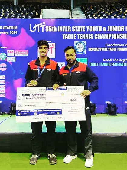 Coaching a player to national success is a proud moment. Here I am with Aakash K J after he secured two Bronze Medals at the 85th Youth and Junior National Championship, a testament to his hard work and our training program.