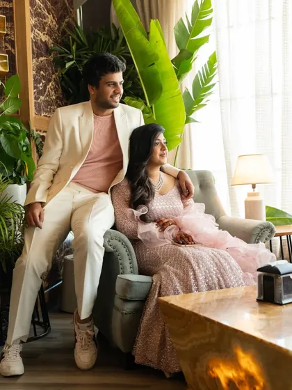 A candid, looking-away shot of the couple, creating a natural and editorial feel for their engagement photos.