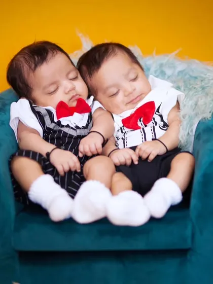 Double the cuteness. This 'Boss Babies' themed shoot with newborn twins was so much fun to create, capturing them sleeping peacefully in their tiny coordinated outfits.