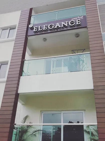 The clean facade of the 'Elegance' apartment building in Bangalore. I handle large-scale exterior painting projects, ensuring a durable and modern finish that enhances the property's curb appeal.