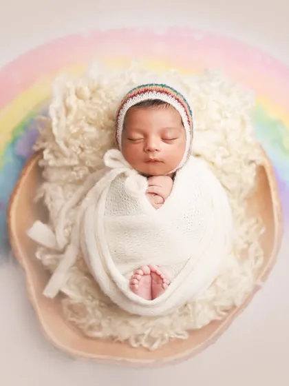 A little rainbow of joy. This setup is especially meaningful for 'rainbow babies' and is a beautiful way to celebrate their arrival. The soft colors create a hopeful and gentle image.