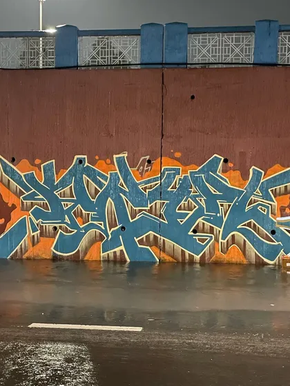 The same "KRYPT" piece as before, but this time captured at night. The wet ground reflects the colors, giving it a completely different mood.