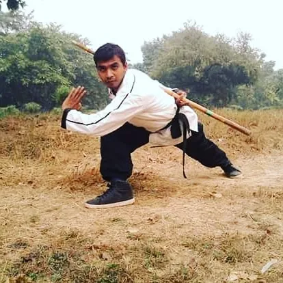 My training covers more than just empty-hand techniques. We also practice with traditional Shaolin weapons like the bo staff to develop coordination, strength, and a deeper understanding of martial arts.