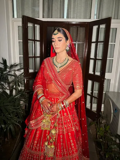 A quiet moment before the ceremony. Vittoria's makeup is kept soft and classic, enhancing her natural beauty and letting her joy shine through.