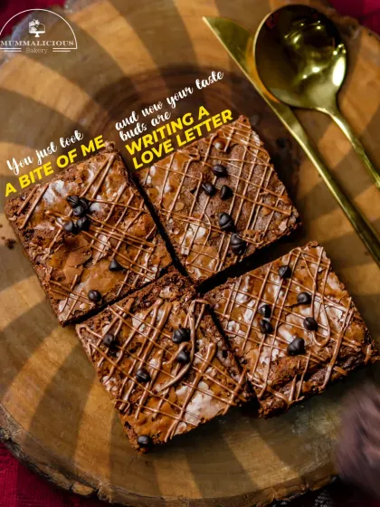 One bite of my Bounty Brownie and your taste buds will be writing a love letter. This close-up shot shows the rich, gooey texture and chocolate drizzle that makes them so special.