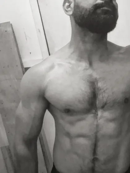 No caption needed. A simple black and white shot of my upper body physique.