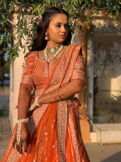 A portrait that shows her poise and elegance. The makeup is soft and romantic, perfect for an engagement.