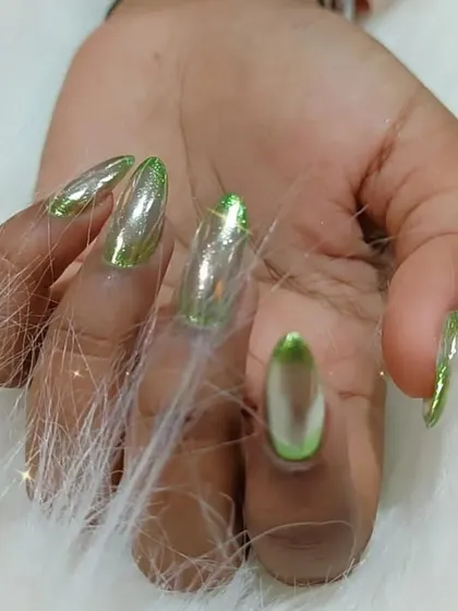 Another angle of the green chrome tip nails, showing the metallic shine.
