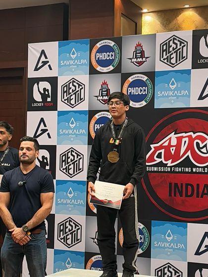 Another one of our athletes on top of the podium. We don't just build fighters; we build martial artists who are fearless in the face of a challenge.