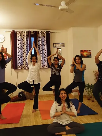 The beautiful energy of a group class at my Delhi studio. Here we are practicing Vrikshasana, the tree pose, finding balance and strength together as a community.