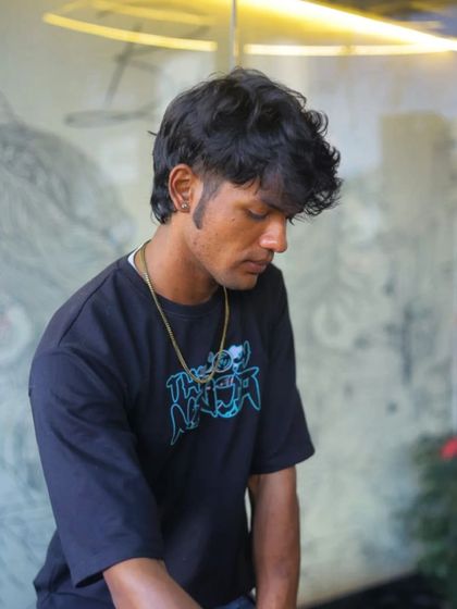 A moment of reflection, listening to the mix before the beat drops.