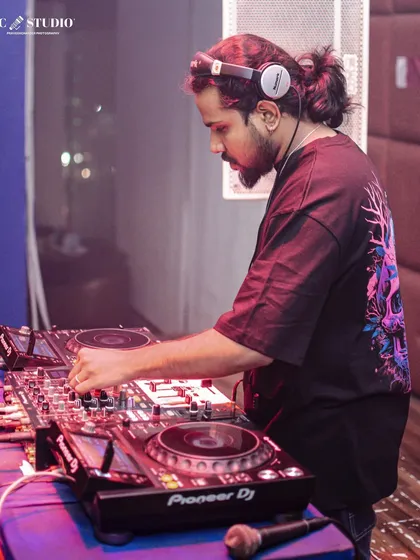 These shots capture me in my element, from different angles and at various events. Each one is a glimpse into my life as a music maker, focused on the craft and connecting with the crowd.