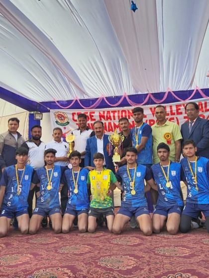 The winning moment at the CBSE National Volleyball Championship. Our U-19 team celebrating their first-place victory with officials after a hard-fought tournament.