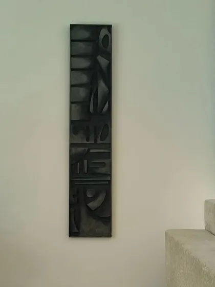 A tall, narrow textured piece measuring 5ft x 1ft. This kind of artwork is perfect for stairways or columns, adding an artistic touch to often-overlooked spaces.