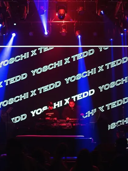 Our names up in lights on the big screen. A powerful visual from one of our duo shows, showcasing our brand as a team.