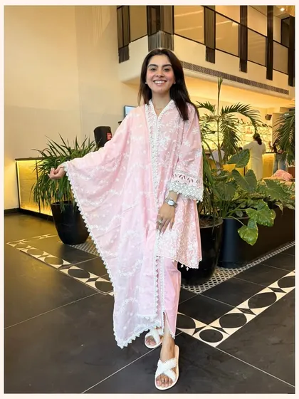 Pretty in pink. This soft pink kurta set features an elegant ombre effect and is finished with my signature lace trim for a feminine touch.
