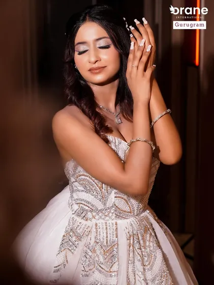 This shot highlights the delicate hand pose and beautiful nails that complete the fusion look. I teach my students that every detail matters for a polished and professional result.