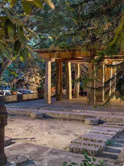 The Stone Mantapa illuminated at dusk, creating a magical and romantic atmosphere for evening events or photoshoots.