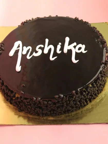 Our Chocochip Dutch Truffle cake is a texture-lover's delight. The sides are coated in mini chocolate chips, adding a delightful crunch to the smooth, rich cake.