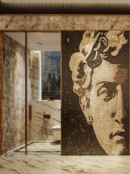 This bath space exudes elegance, adorned with a dramatic mosaic artwork that adds a sophisticated touch. A neutral color palette enhances the opulent ambiance, creating a serene retreat where sleek fixtures and rich textures elevate the room to a realm of indulgence.