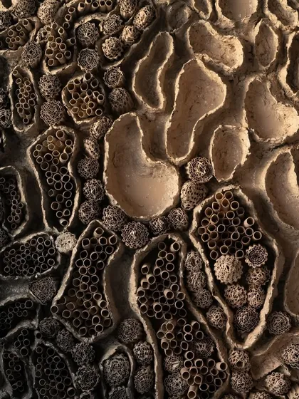 The magic is in the details. This is a close-up of my artwork "Self Discovery," where you can see the intricate textures I create using upcycled paper. Each layer tells a story, and the way it plays with light brings a different feeling as your day goes on.