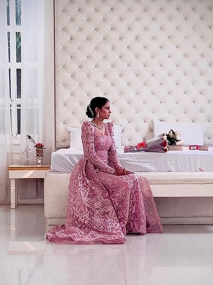 A beautifully styled shot of a bride-to-be in a pink lace gown. This image shows how my rental gowns can be used for elegant and editorial-style photoshoots.
