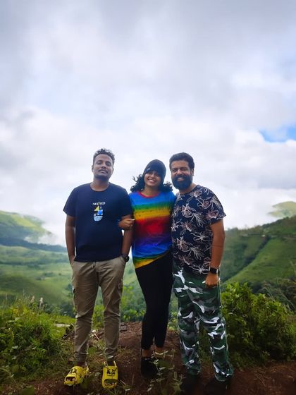 A happy trio against the backdrop of the rolling green hills.