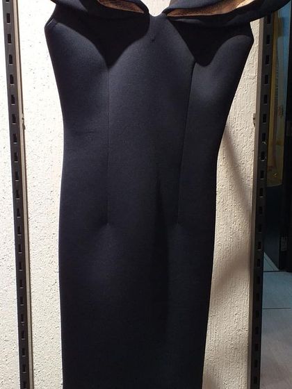 A classic little black dress with a unique off-shoulder sweetheart neckline. This versatile piece is a wardrobe staple that you can get at an amazing outlet price.