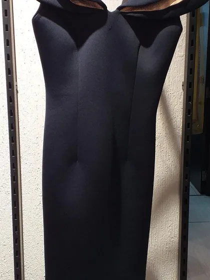 A classic little black dress with a unique off-shoulder sweetheart neckline. This versatile piece is a wardrobe staple that you can get at an amazing outlet price.