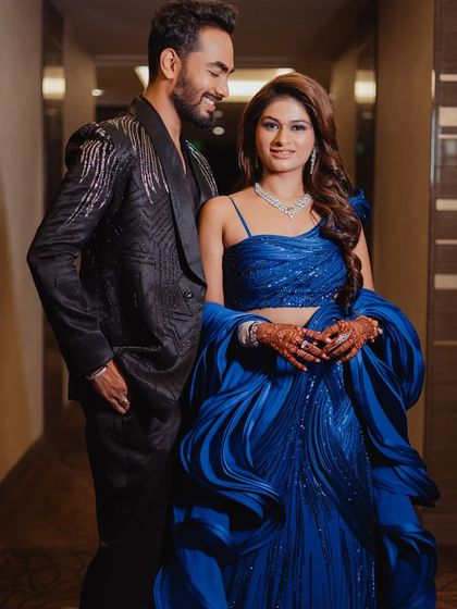 A romantic couple shot. Her makeup is designed to look flawless and captivating even in close-up moments.