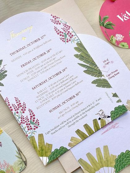 The full itinerary card, showing the schedule for the multi-day wedding weekend. The beautiful illustrations make it more than just a schedule; it's a piece of art.