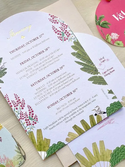 The full itinerary card, showing the schedule for the multi-day wedding weekend. The beautiful illustrations make it more than just a schedule; it's a piece of art.