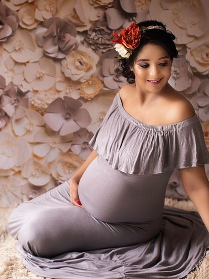 Another lovely portrait from the same floral setup. This shows how we can capture different angles and expressions to create a varied and beautiful gallery.