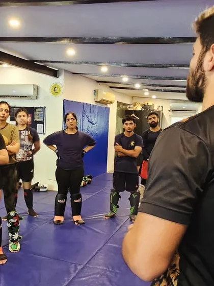 A group of our female members focused and ready to learn during the Muay Thai seminar. We are proud to have a strong and dedicated group of women training with us.