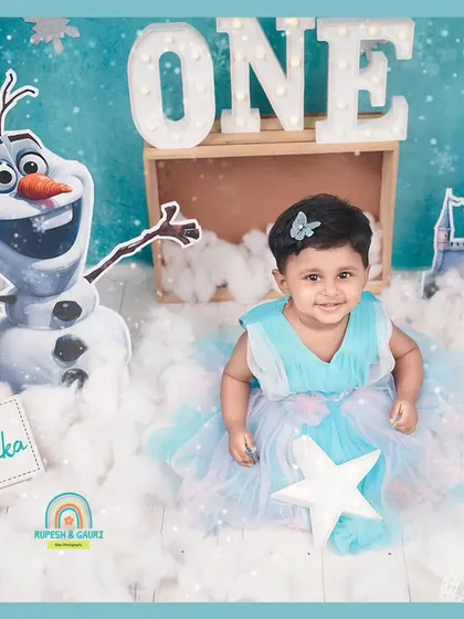 A sweet portrait of the birthday girl, Adhvika, during her 'Frozen' themed first birthday shoot.