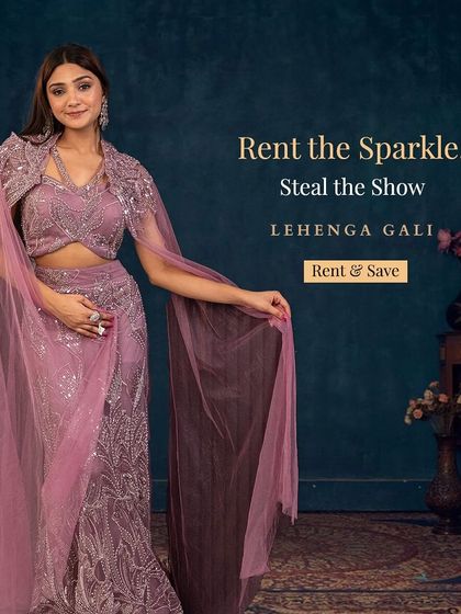 Rent the sparkle, steal the show. This lilac lehenga with a sequined blouse and cape is a modern and glamorous choice for any wedding party.
