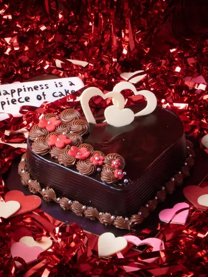 Our 'Love you Forever' Valentine's Cake is a heart-shaped Dutch truffle cake, beautifully decorated to express your feelings on a special day.