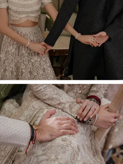 A close-up of Nishna and Armaan holding hands. These small gestures of connection, often missed in the larger celebration, are what we look for to tell the intimate story of a couple.