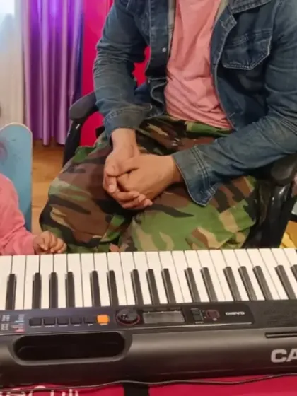 Even the smallest fingers can make music. A toddler explores the keyboard during one of our introductory music sessions in our Mumbai class.