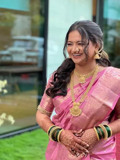 A happy, candid shot of the bride, her joy is infectious.