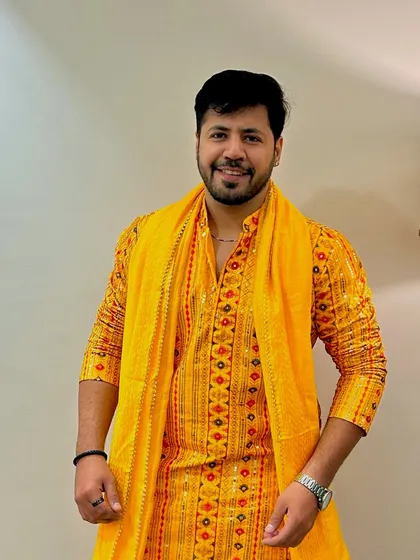 Another look at my festive yellow outfit. I love adding a pop of color to the celebrations.