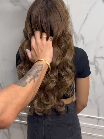 A close-up of the balayage, highlighting the intricate placement of colors and the hair's healthy shine.