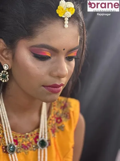 A close-up of the sunset-inspired eye makeup, a key feature of this festive Haldi look.