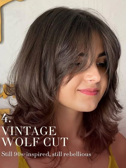 The vintage wolf cut is a modern take on a 90s classic. It's a bit rebellious and full of texture, perfect for someone who wants a stylish cut with an edge.