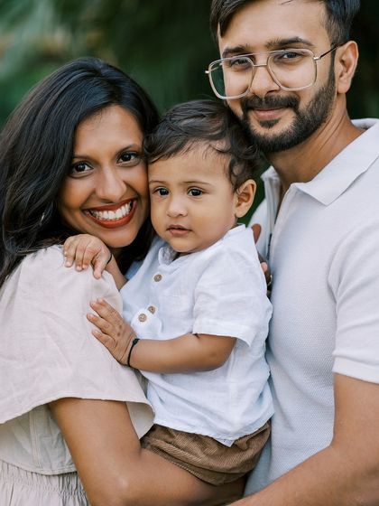 A beautiful family portrait celebrating a first birthday. Creating a yearly tradition of photos is a wonderful way to build a visual legacy for your family.